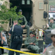 Law-enforcement officials sit at the scene of a motorcyle-gang shootout at the Twin Peaks restaurant May 18, 2015, in Waco, Texas.
Erich Schlegel/Getty Images
